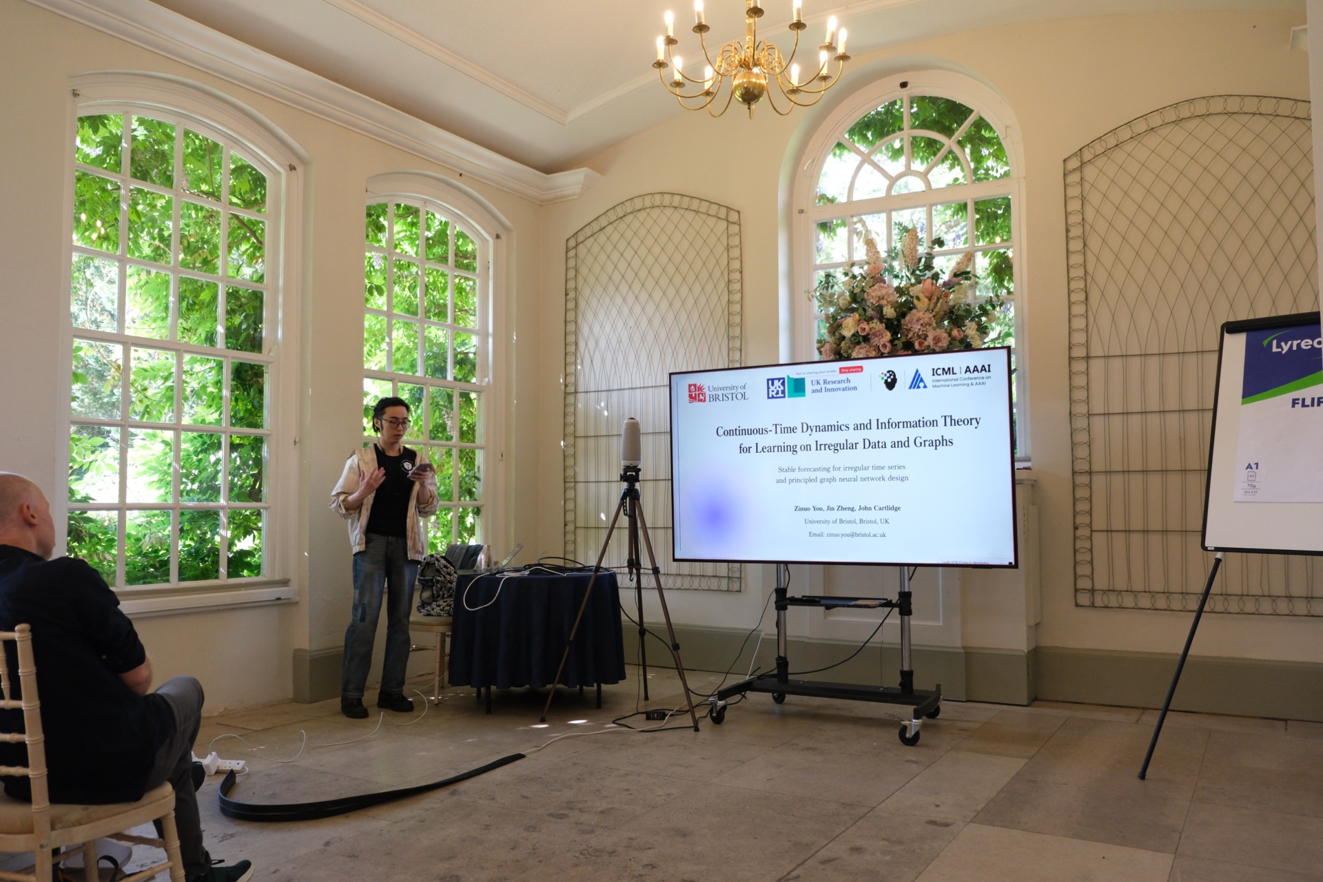 Presenter speaking at the Goldney Hall Orangery