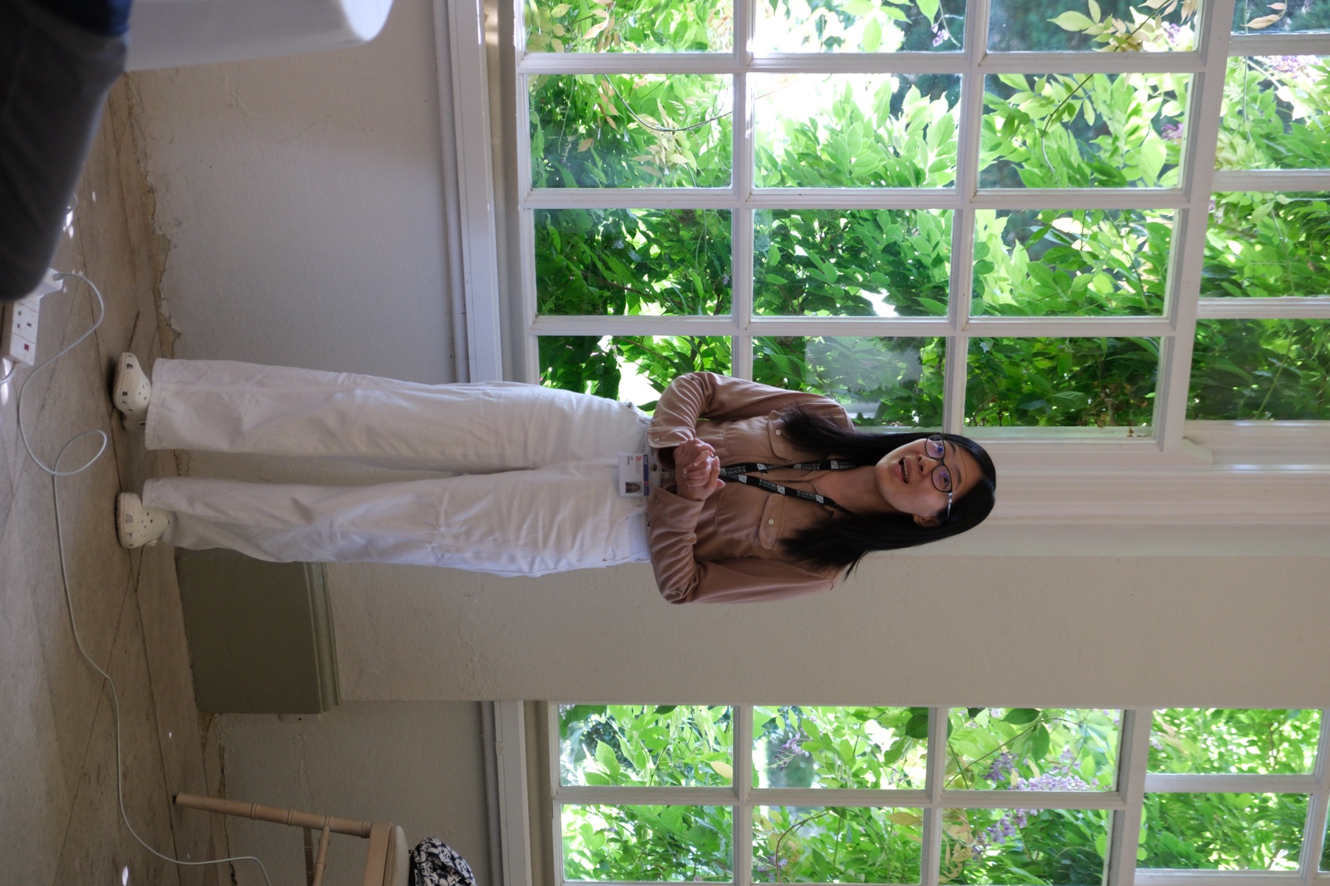 Dr Jin Zheng delivering closing remarks in the Orangery